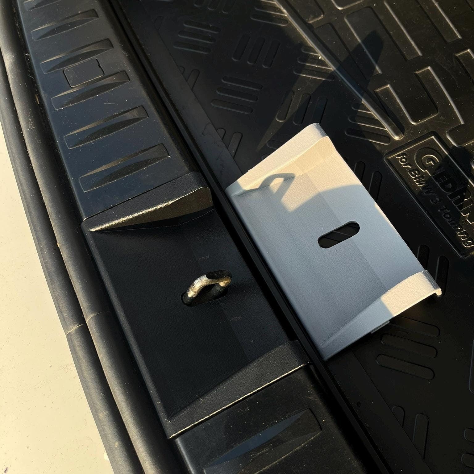 BMW E91 Trunk Latch Cover